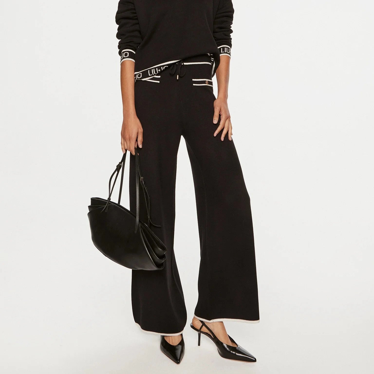 PANTALONE LIUJO IN MAGLIA CON BOTTONI E LACCIO CHAN