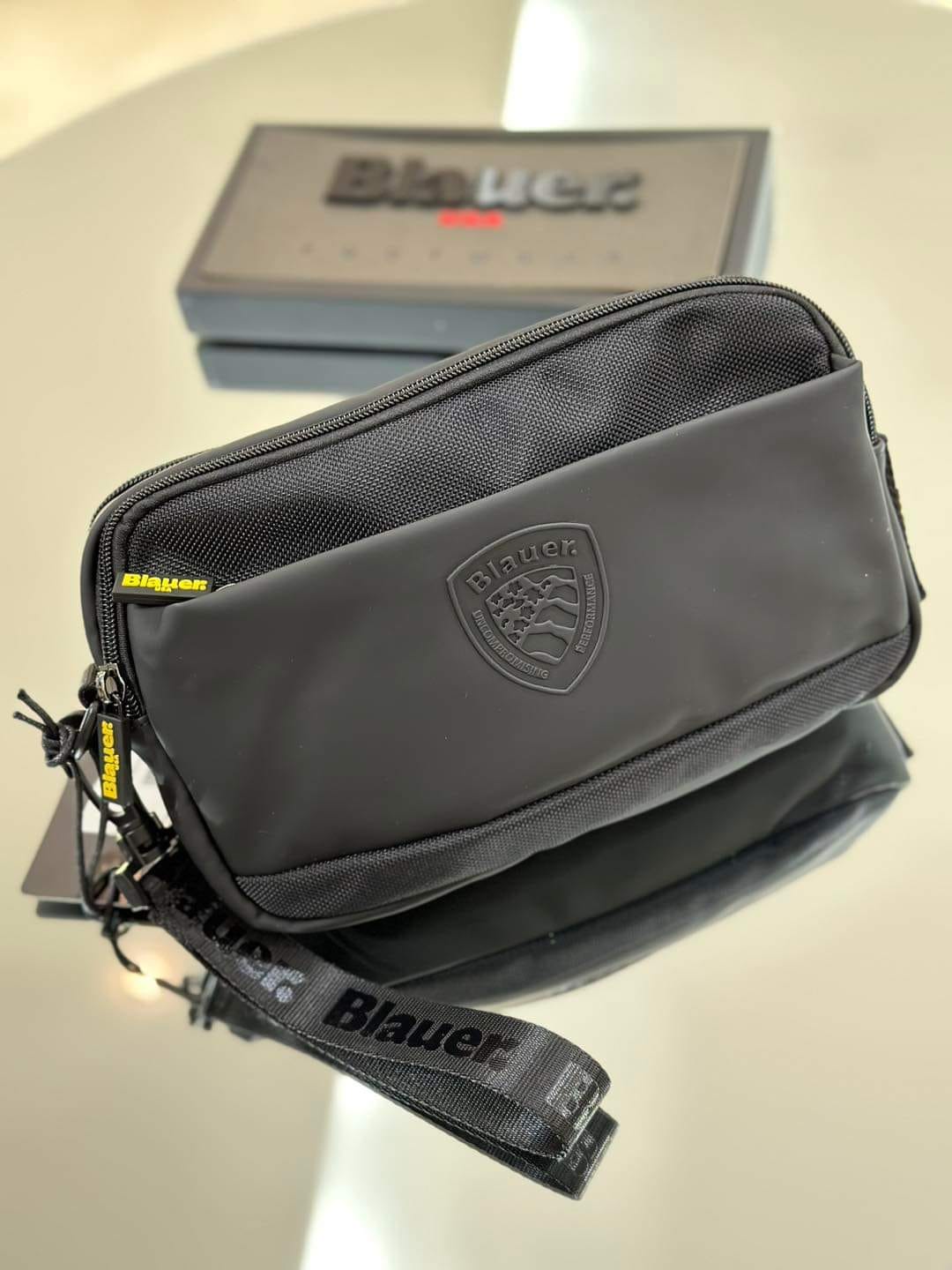POCHETTE BLAUER THOM CLUTCH BUSTINA RUBBER